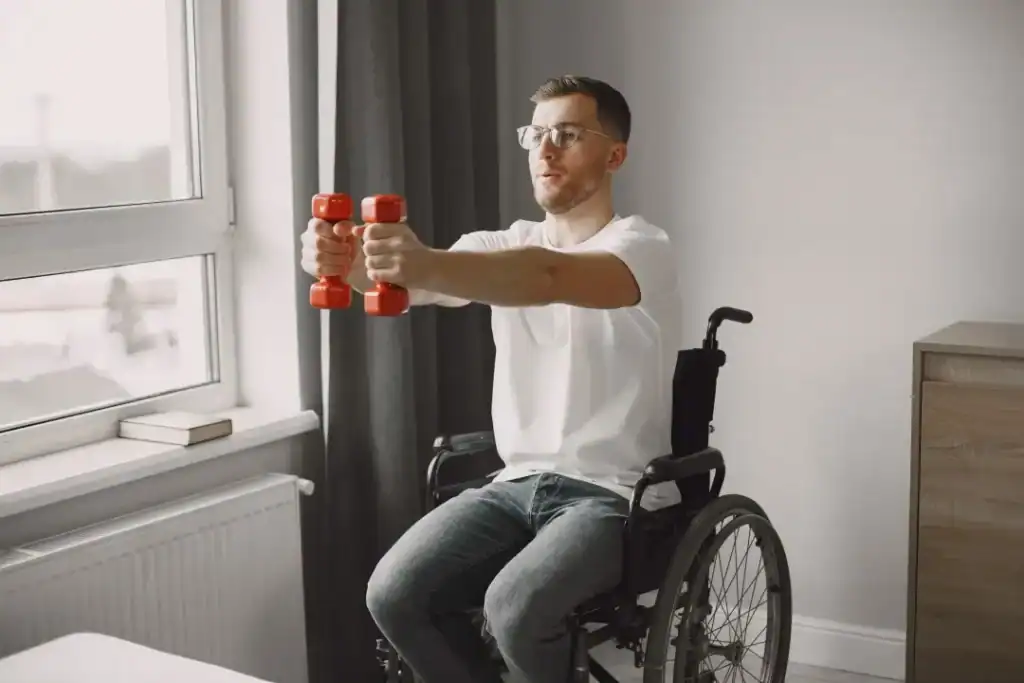 Empowering Weight Loss: A Comprehensive Guide for Individuals with Disabilities 1 Image of man doing exercise in his wheelchair to aid weight loss Lewes