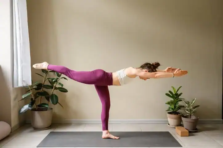 Achieving the Perfect Tone: How Often Should You Exercise for Results? 1 Woman doing Yoga exercise Lewes to help with toning the body.