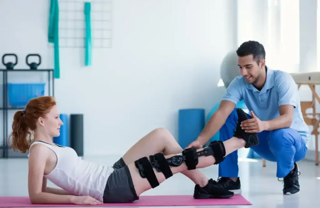 Debunking Meal Timing Myths: The Truth About Muscle Recovery 1 Woman having treatment to help muscle recovery Lewes after an injury