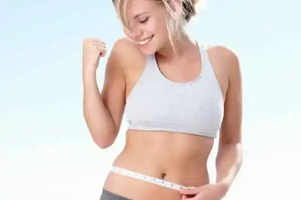 Unraveling the Mystery: Where Does the Body Fat Loss From First? 3 Image of woman happy with fat loss Lewes