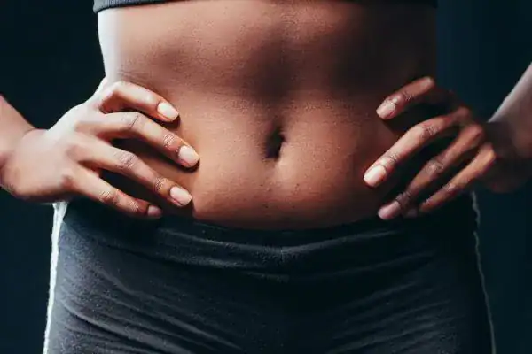 Toning Your Stomach: The Ultimate Guide to Achieving a Sculpted Stomach While Shedding Pounds 1 Image of a toned stomach after non surgical treatment Lewes
